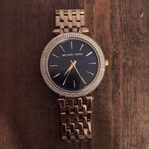 Micheal Kors - gold watch/navy blue watch face